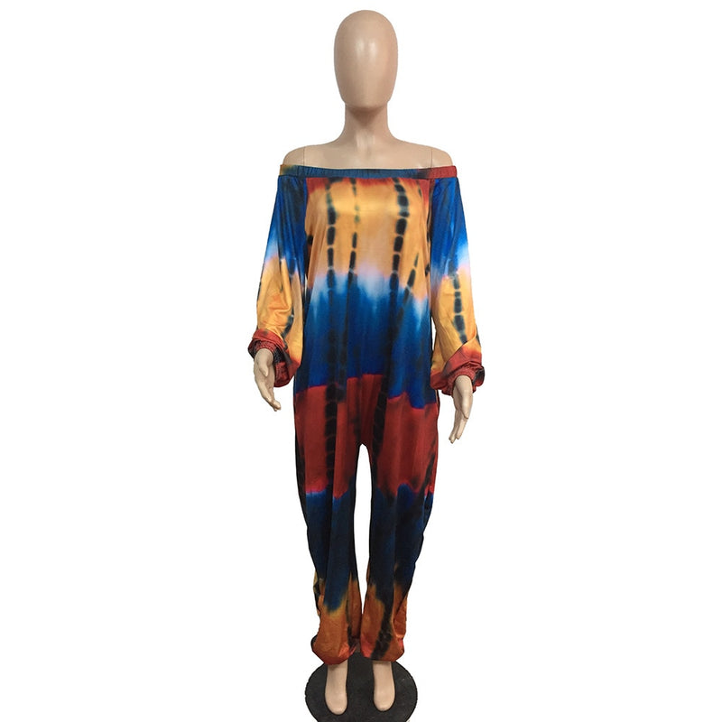 Macacão feminino plus size com estampa tie dye manga comprida