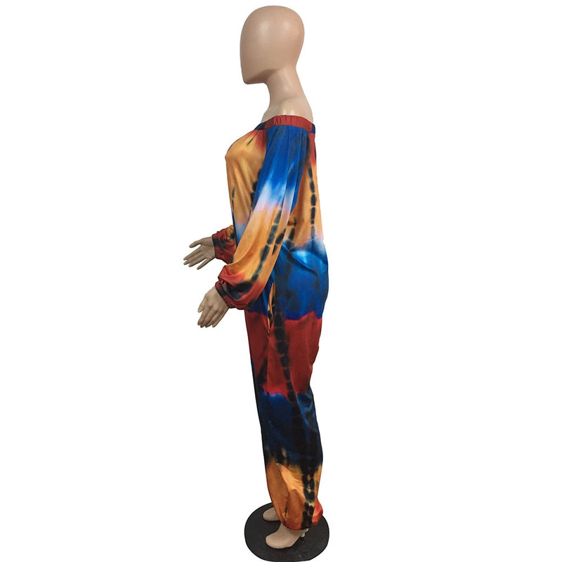 Macacão feminino plus size com estampa tie dye manga comprida