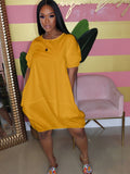 Plus Size Vestido solto com decote redondo e ombro caído na altura do joelho