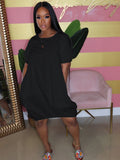 Plus Size Vestido solto com decote redondo e ombro caído na altura do joelho