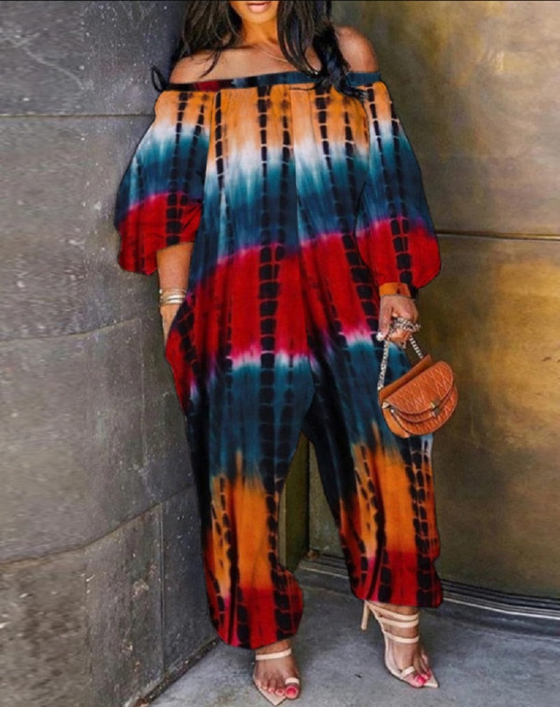 Macacão feminino plus size com estampa tie dye manga comprida
